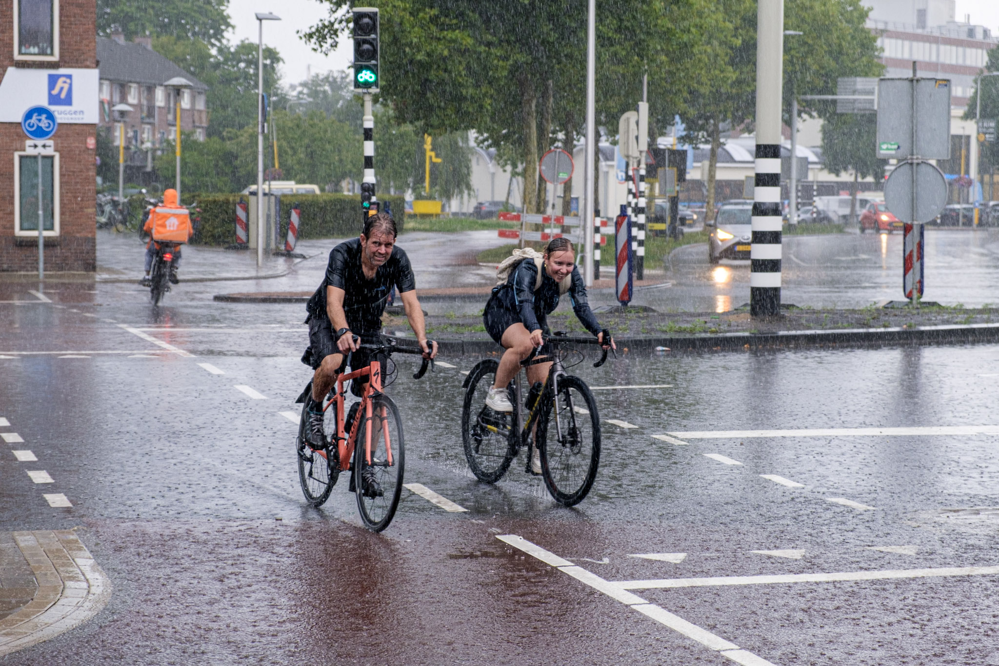 Fietsers in de regen